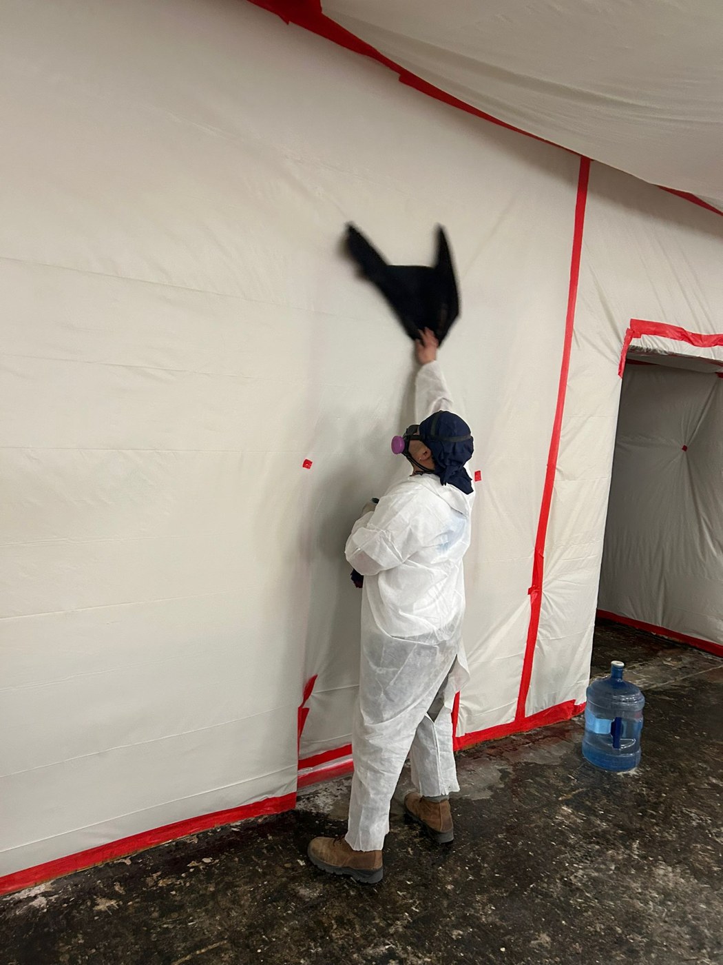 Gladiators Environmental worker performing final cleanup